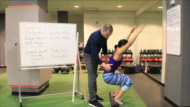Dr. Brent Brookbush teaches the sign &#34;Posterior Pelvic Tilt&#34; during a lecture on the Overhead Squat Assessment