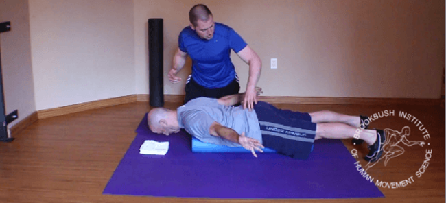 A prone T exercise targeting an underactive middle and lower trapezius