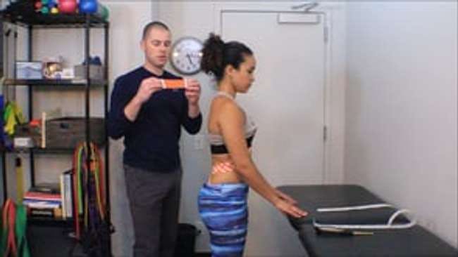 Kinesiology taping to promote diaphragm facilitation.