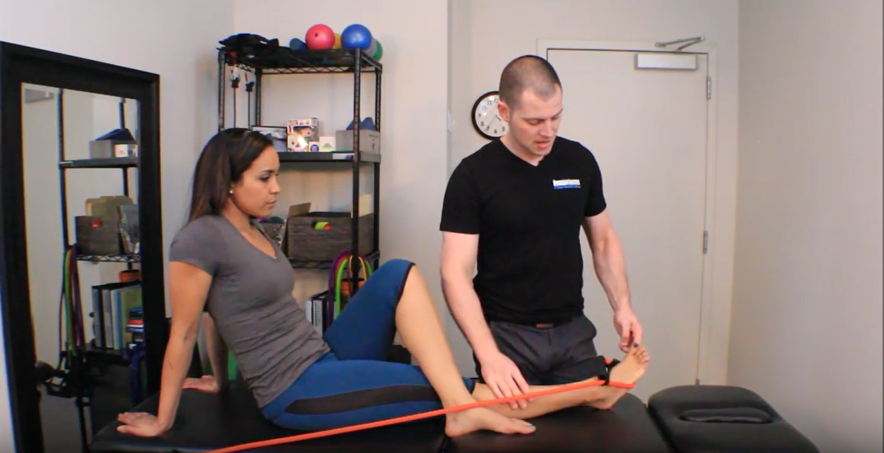 Dr. Brent Brookbush instructs a patient on how to perform Tibialis Posterior Activation with toe extension to reciprocally inhibit the long toe flexors.